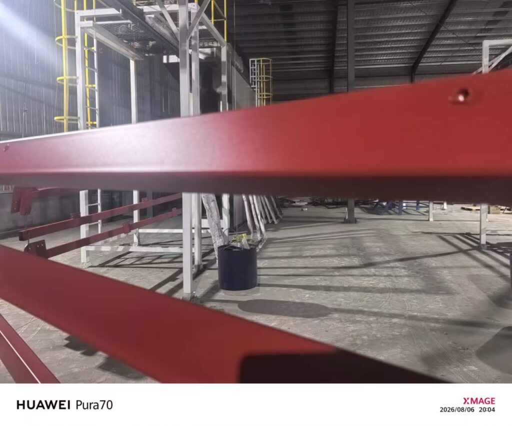 Automatic powder coating line of the kind serious padel court manufacturers operate in-house